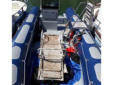 Retirats 80 quilos de residus del fons marí de Porto Petro